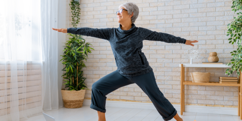 Senior women doing yoga