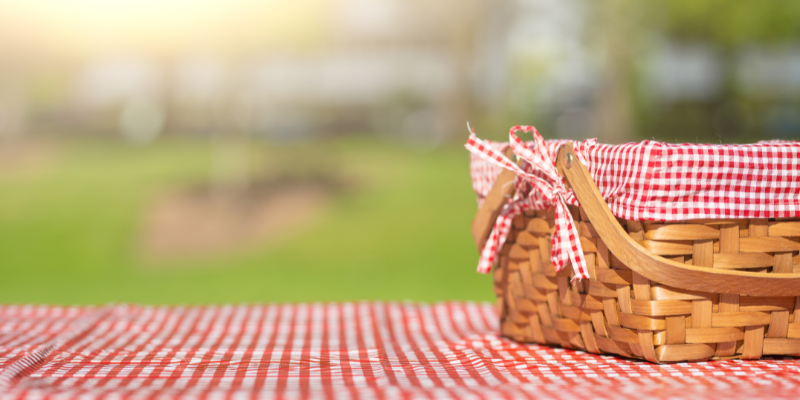 Picnic table outside on a blanket